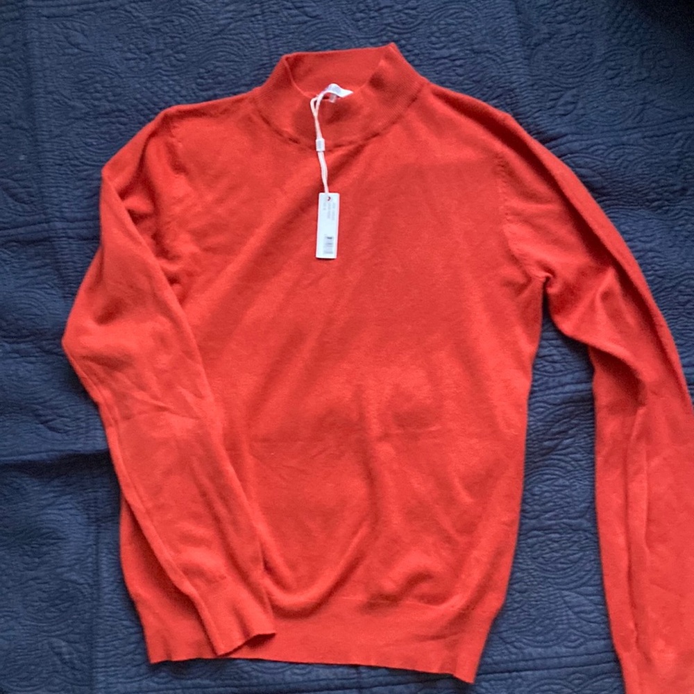 Mock neck turtleneck sweater.